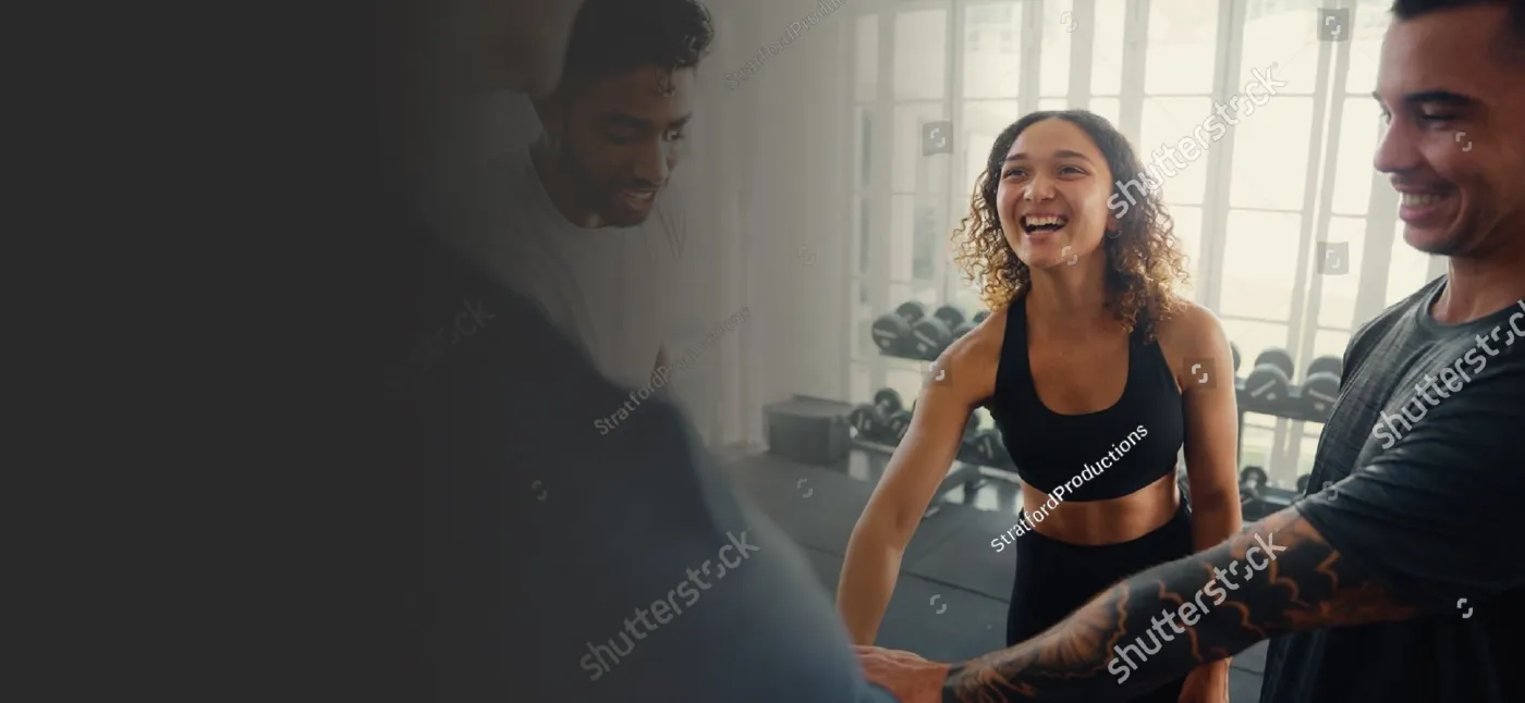 Members chatting and laughing together after a workout